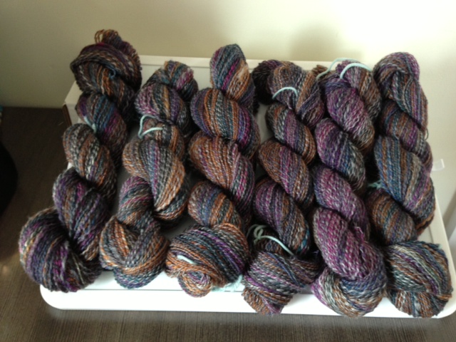 Here we have about 1200 yards of 2-ply. Spun from 2 4-oz braids of hand-dyed BFL from Frabjous Fibers in the Cathedral and Potash colorways.