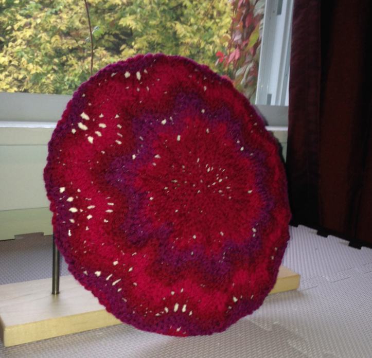 Look! More chain ply. I love how the stripes showed up in this hat. It looks like a flower. It looks planned. But it wasn't.  Fiber is Lorna's Laces Shepherds Wool. Don't recall the colorway.