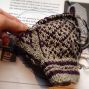 I made it about halfway through the mitten when I finally had to acknowledge that I was knitting WAY too loosely. In my effort to keep my floats loose I was knitting everything like rubber-girl. So I ripped back.